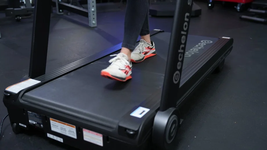 Close view of someone running on an Echelon Stride-6s.