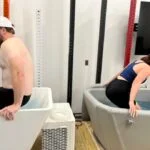 Two people getting into the Plunge and Plunge Air cold tubs, respectively
