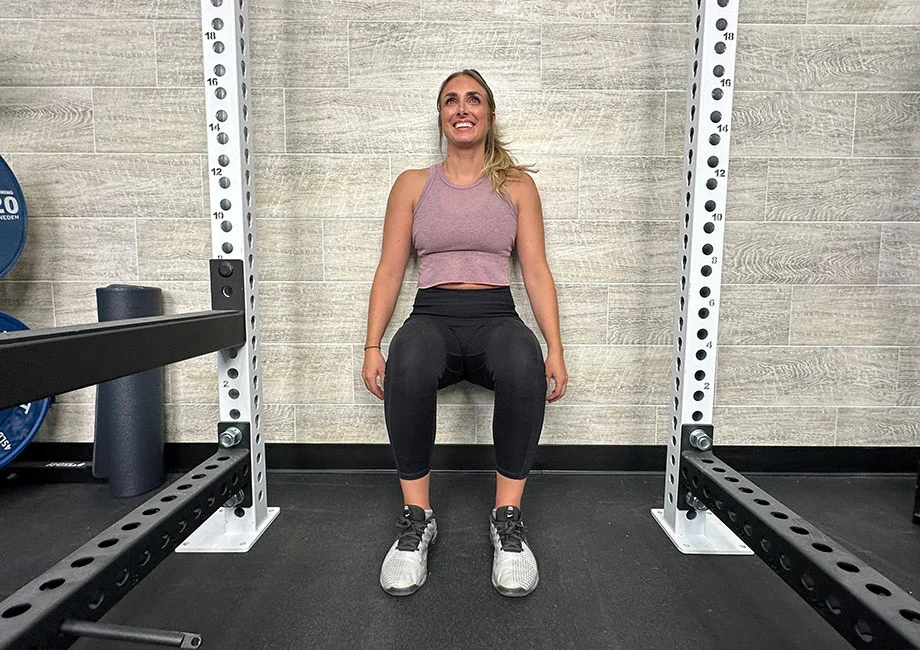 woman-doing-wall-sit-front-view