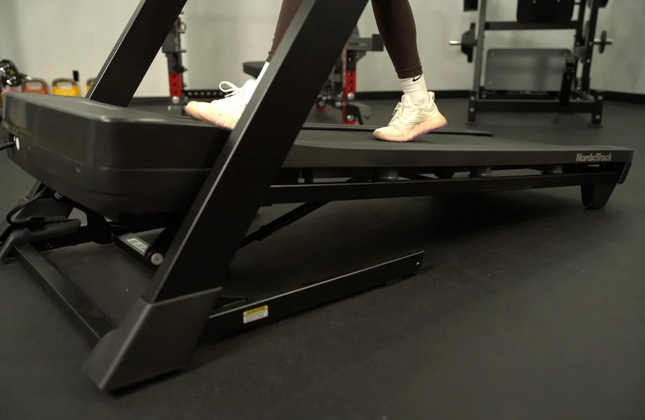 Our tester walking at an incline on the NordicTrack T Series 10 Treadmill
