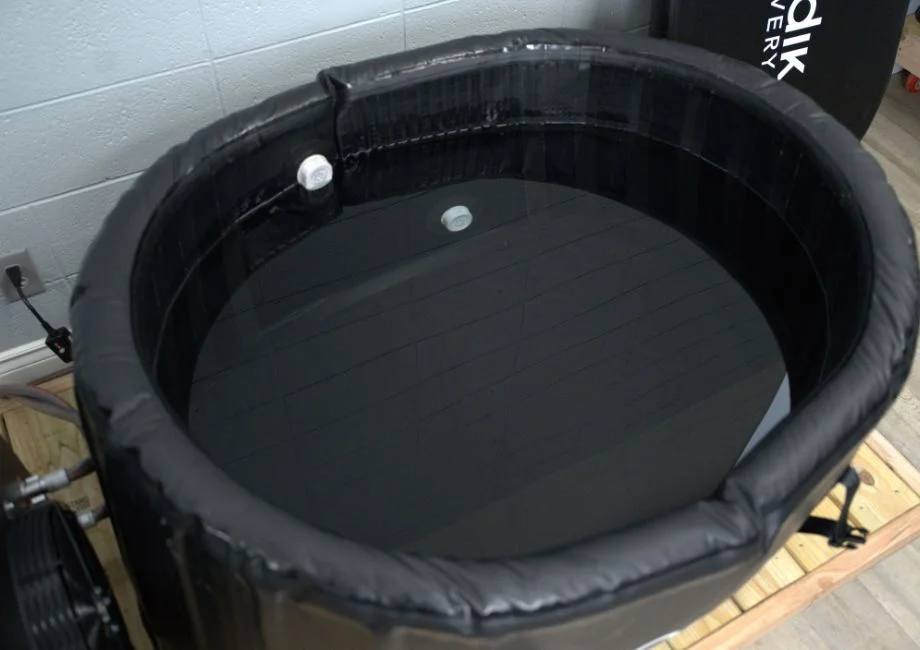 The Nordik Recovery cold plunge tub filled with water