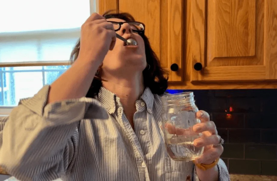 Our tester taking a full serving of Bioniq Go multivitamin