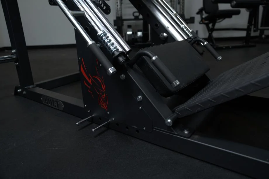 A close look at the logo on the base of a Bolt Fitness Hack Squat Leg Press machine.