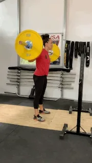 woman doing back squat