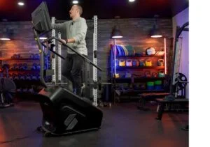 stepr stair climber stepr full view walking on stairs while touching screen 1 e1718748335519