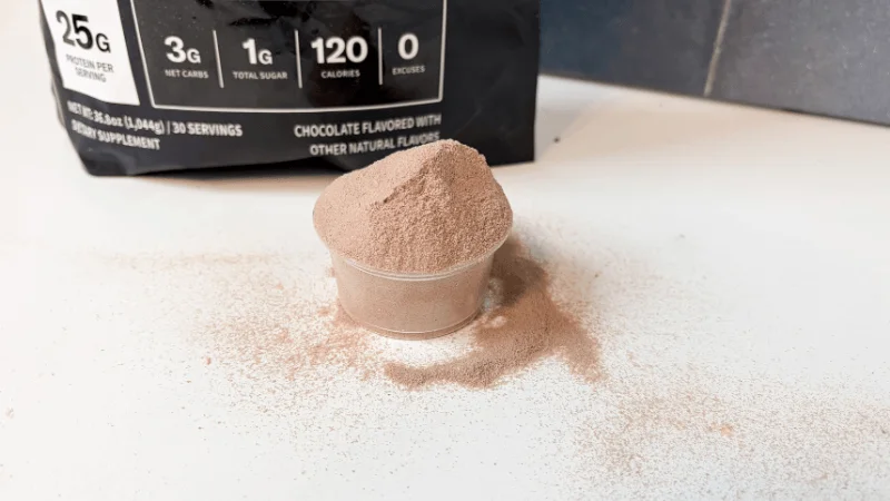 A full, rounded scoop of NOBULL Grass-Fed Whey Protein Isolate
