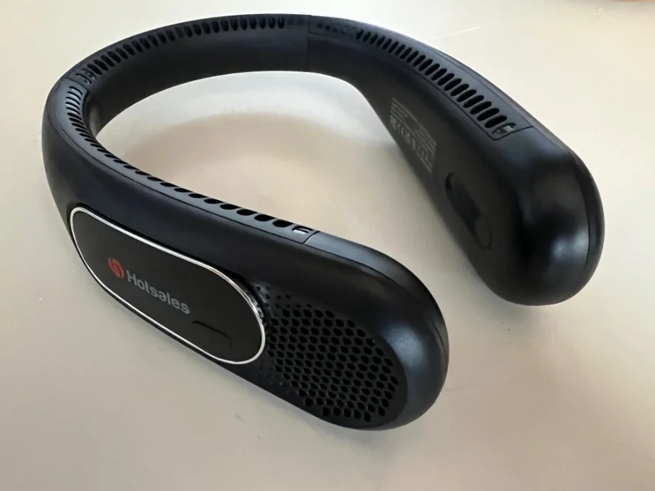 A image of the front of the Hotsales Neck Fan resting on a table
