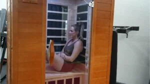 dynamic sauna dynamic andora infrared sauna sitting side ways in sauna