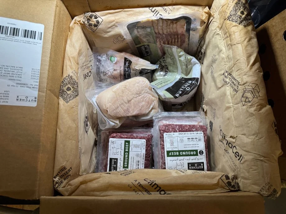 Looking down into a freshly-opened package from ButcherBox.