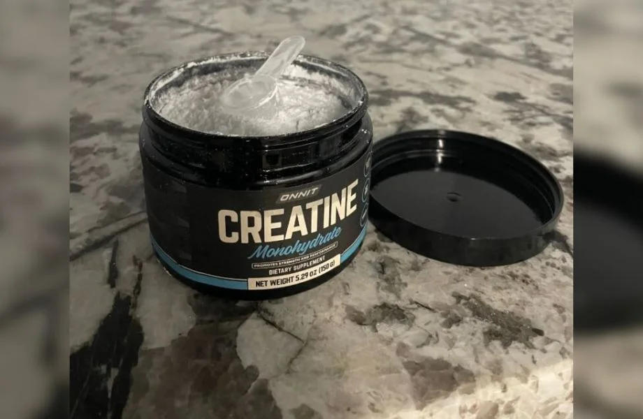 Open tub of Onnit Creatine