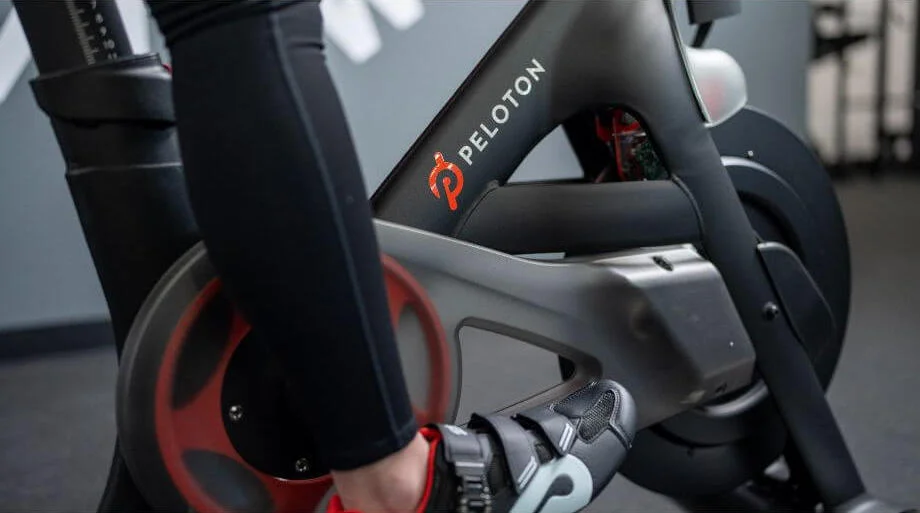 peloton shoes on pedals of a peloton bike