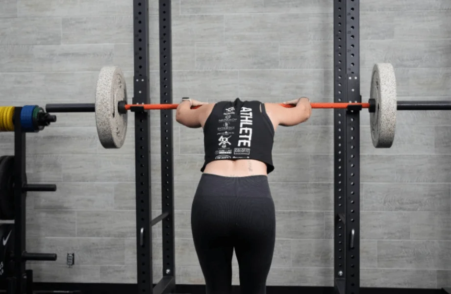 Our tester resting between sets while training with the Nike Grind Bumper Plates