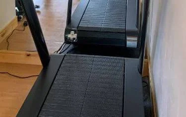 The rubberized slats on the Peloton Tread+ provide a comfortable walking or running experience.