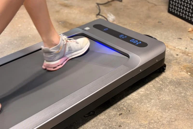 A person walking on the MERACH UltraWalk W60 Plus Walking Treadmill