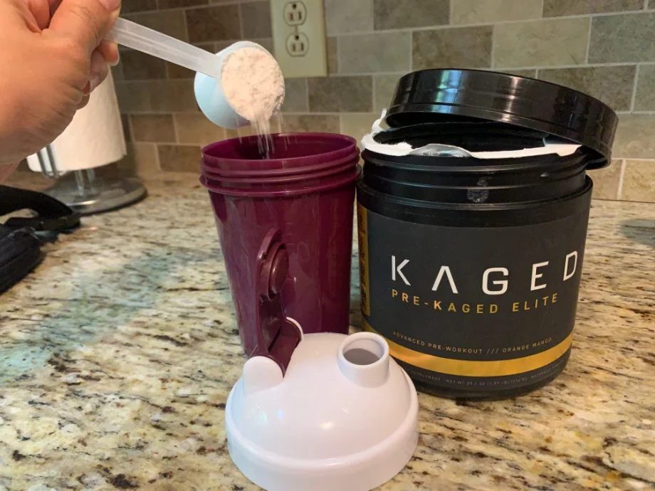 Kaged Pre-Kaged Elite being poured into a shaker cup