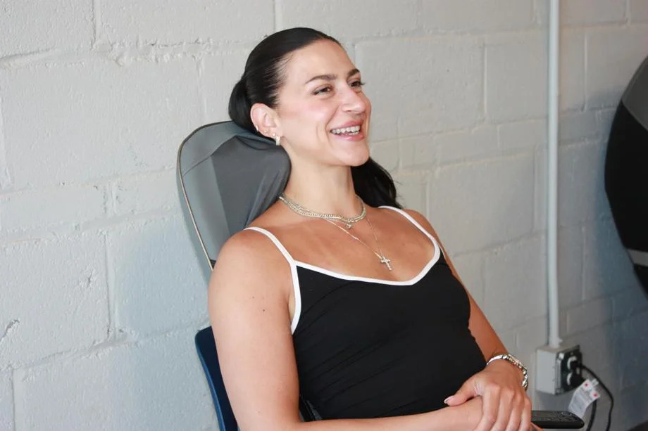 Our tester smiles while using the Homedics Shiatsu Elite II