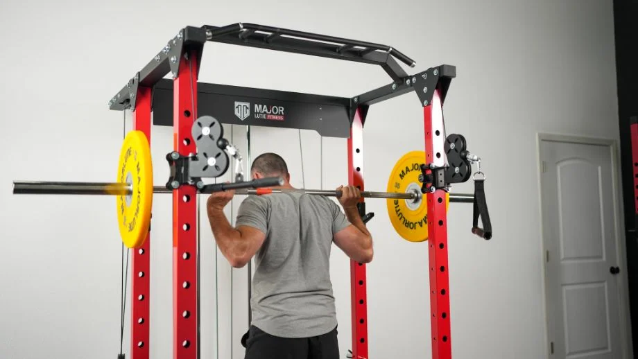Man about to back squat for the Major Lutie Power Rack Review cover