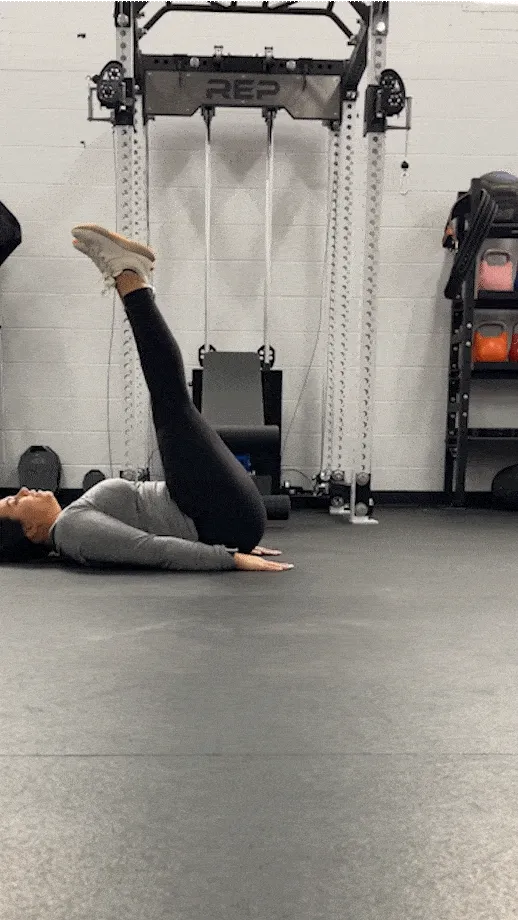 woman doing leg raises