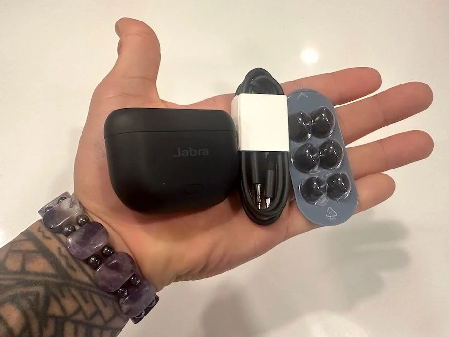 Looking at the Jabra Elite 10 package contents.