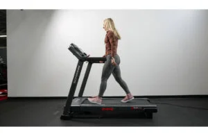 woman walking schwinn 810 treadmill