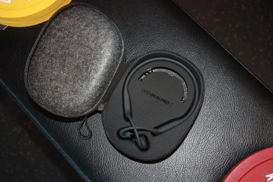 Looking at an OpenRun Pro 2 wireless headset in the travel case.