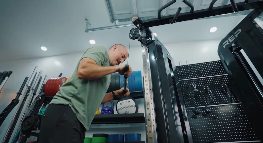 GGR founder Coop Mitchell performs triceps pushdowns on the REP Arcadia Max Functional Trainer
