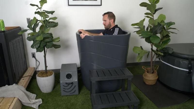 Man sitting in the Nordic Wave Viking Premier cold plunge tub