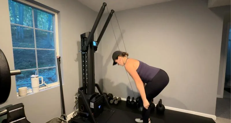 Our product tester working out with the FitTransformer Titan Plus Home Gym