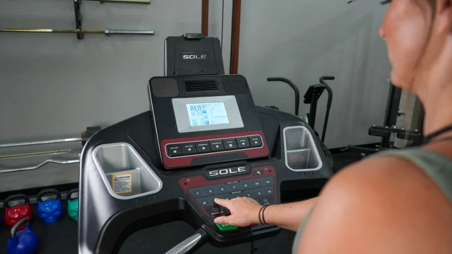 woman using the console on the sole f63