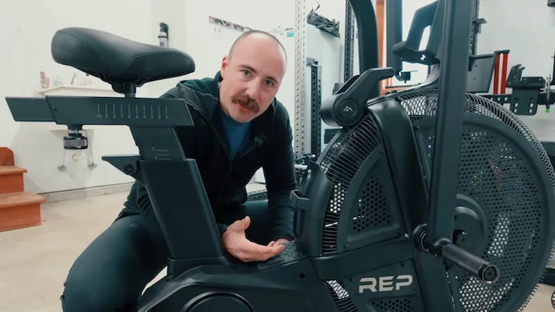 Coop showing the flywheel on the REP Strive Air Bike