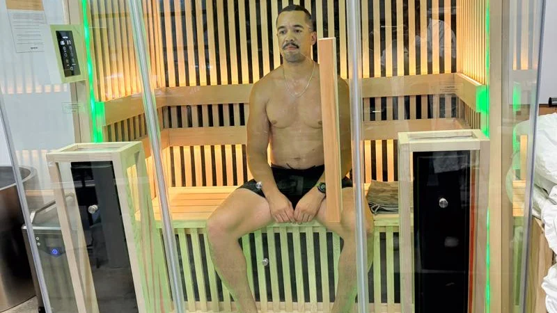 Our product tester in the Plunge Infrared Sauna Pro XL with green light
