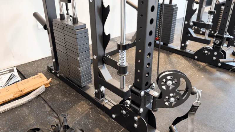 The cable pulley trolleys and built-in weight stacks of the Major Fitness B52 Pro