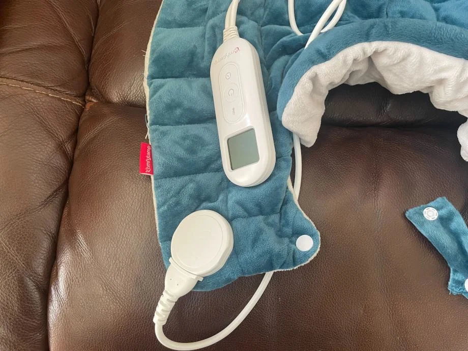 A close look at the controls on a Comfytemp Neck and Shoulder Heating Pad