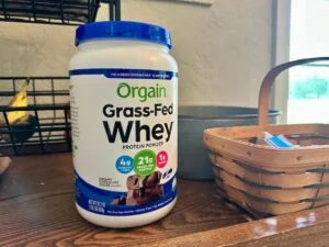 orgain grass fed whey protein powder full image on shelving 1