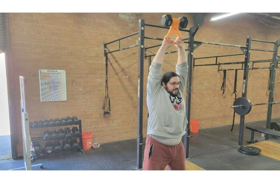 Doing American kettlebell swings with the Kettle Gryp