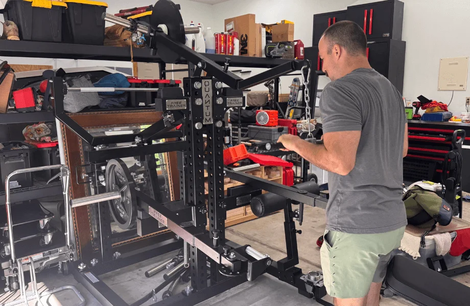 Our tester training with the Quantum Free Trainer in their home garage gym