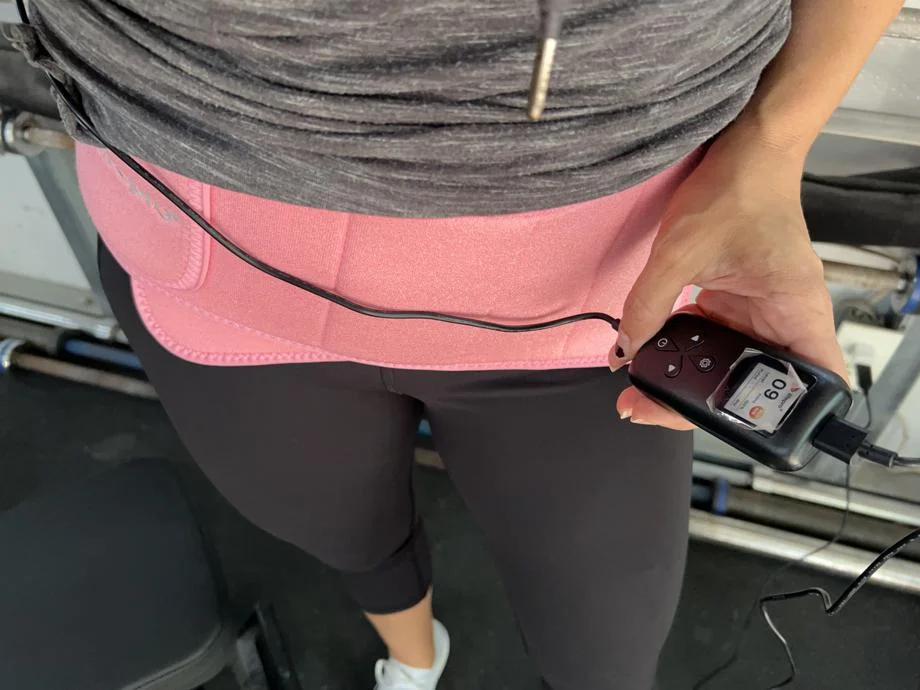 Our tester using the LifePro Red Light Therapy Belt