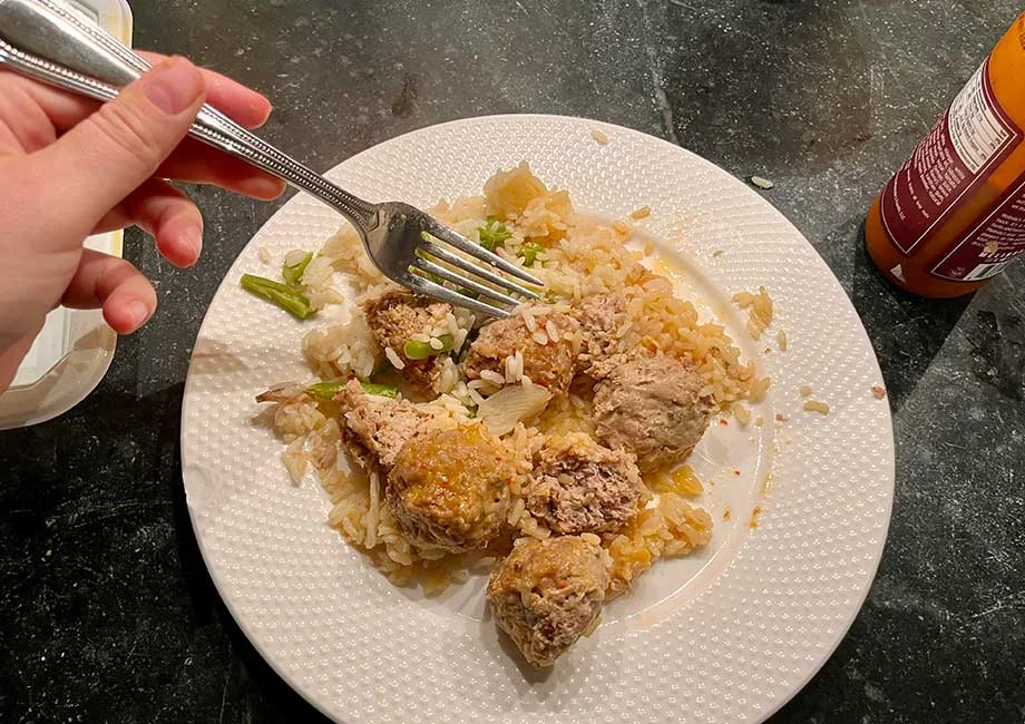 Eating a frozen meal from Muscle Meals 2 Go