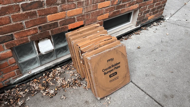A delivery of PRx Crumb Rubber Bumper Plates at our tester's home