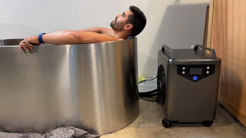Our product tester soaking in the tub of a Polar Monkeys Contrast Edition Plunge.
