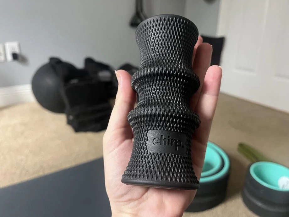 Our tester holds up the Chirp Wheel Foot Roller