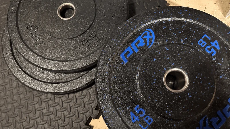 PRx Crumb Rubber Bumper Plates in a home gym