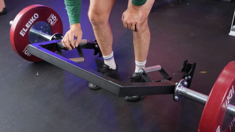 Photo of the Titan Open Trap Bar losing balance and dropping to one side