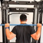 Our tester unracking a barbell from the Major Fitness B52 Pro