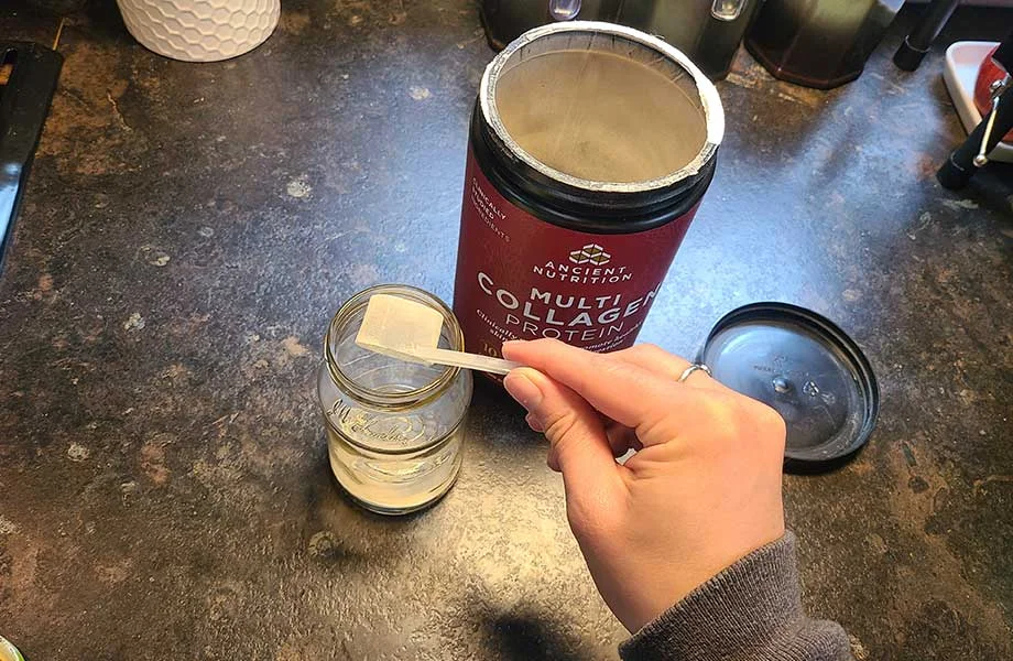 Mixing a serving of Ancient Nutrition Multi Collagen Protein.