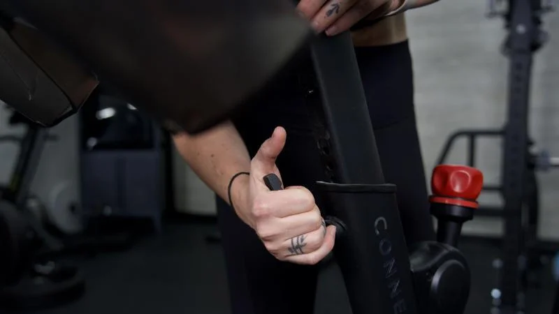 Locking down the handlebar height on an Echelon EX-5 exercise bike