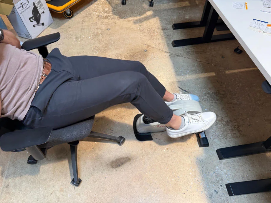 Using the Sunny Health & Fitness Magnetic Mini Exercise Bike at work