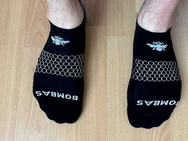 A person wearing the Bombas Grippers socks