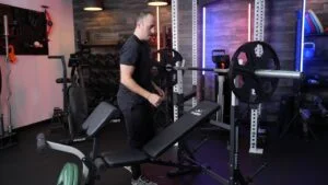 man with flybird olympic weight bench 1