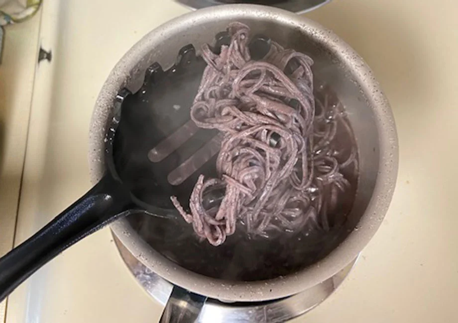 Freshly cooked black bean pasta from The Only Bean.